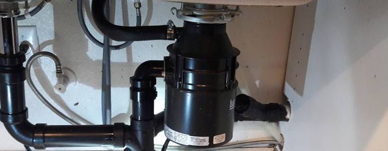 garbage disposal leaking from bottom